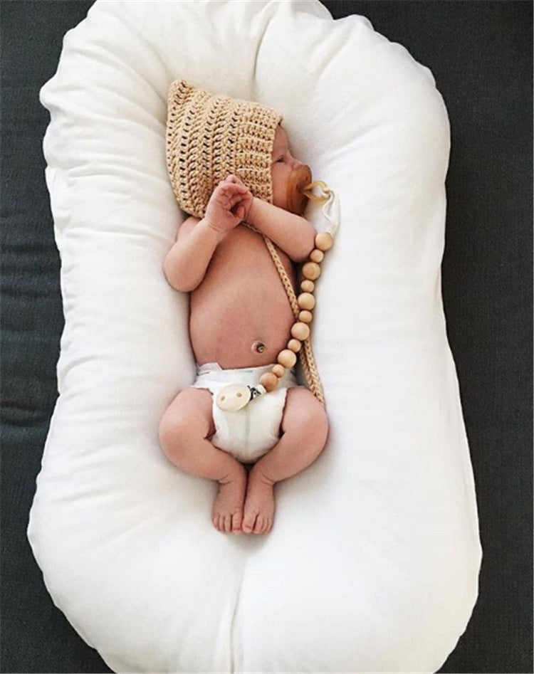 Cocon de sommeil bébé PetitCosy™
